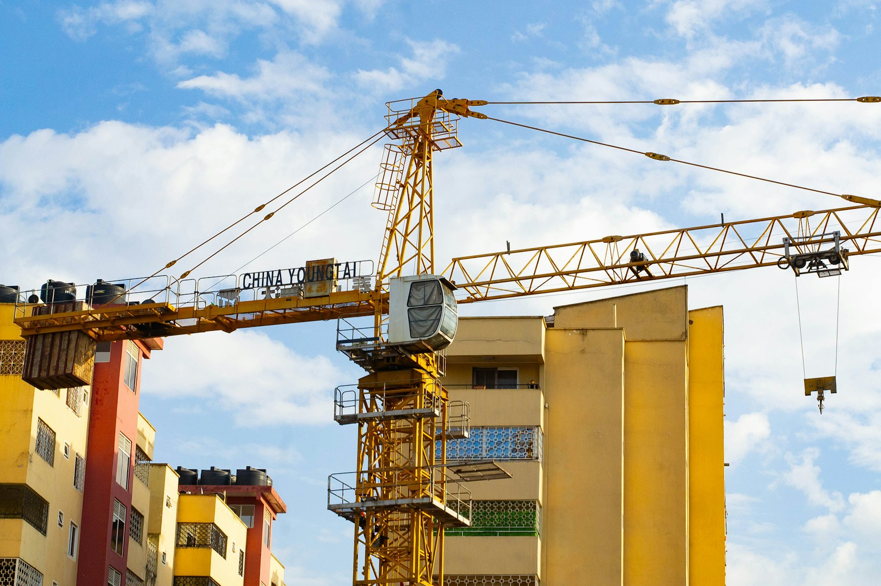 A tower crane above a building under construction in Nairobi